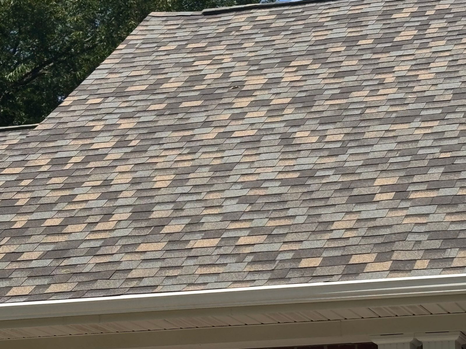 Close-up of new multi-tone architectural shingles in Maryville, TN by McGuire Roofing