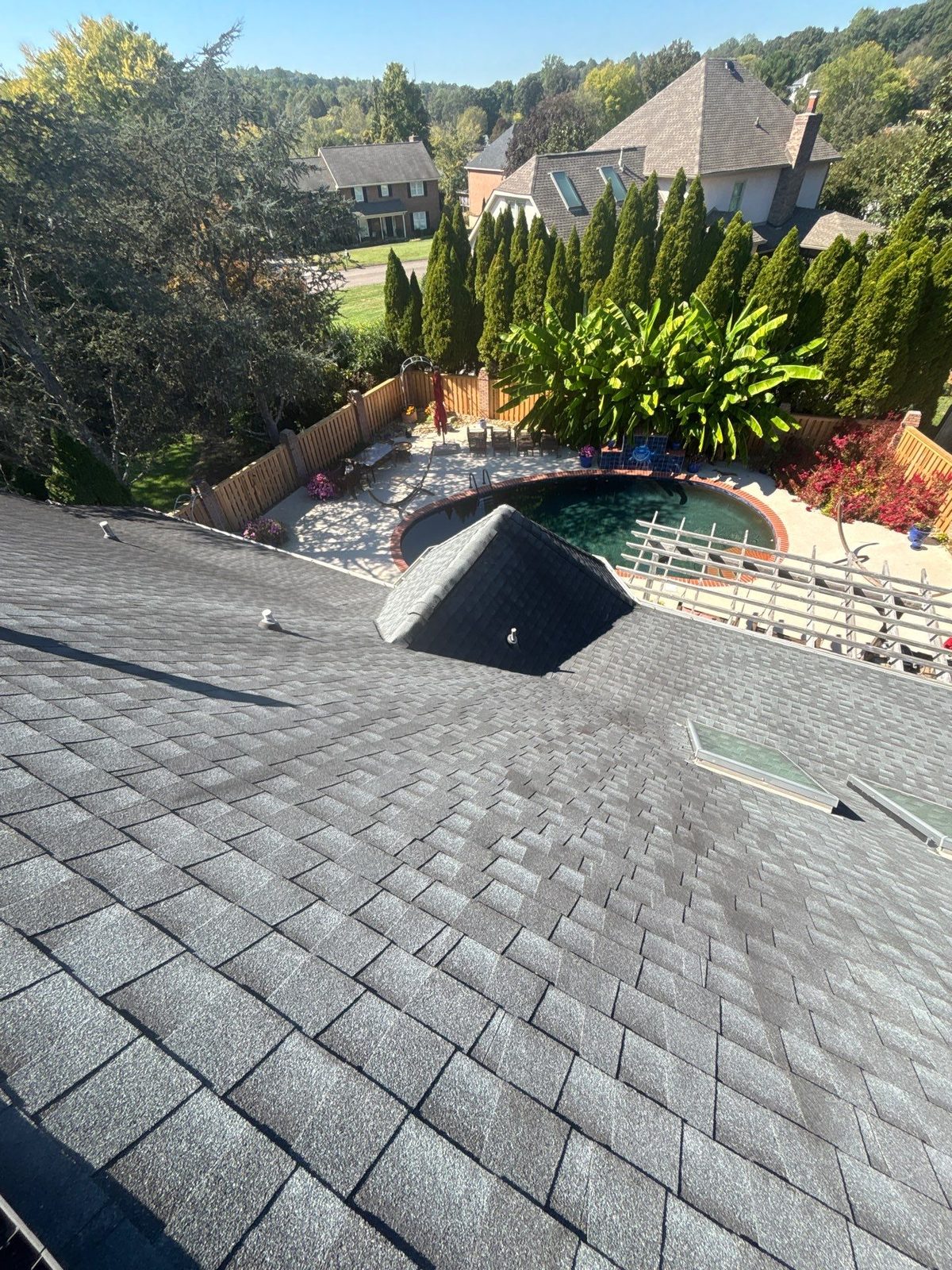 Gray architectural shingle roof replacement on a home in Powell, TN by McGuire Roofing