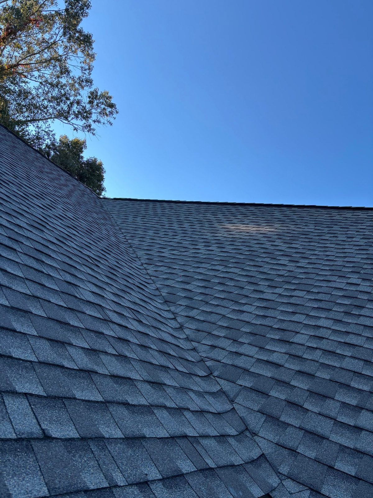 Gray architectural shingle roof replacement in Tellico Village, TN by McGuire Roofing